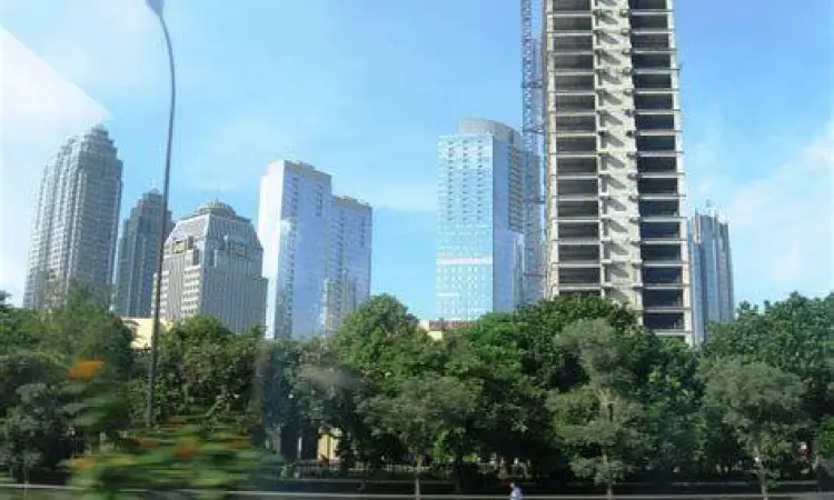 Gedung SCBD terlihat dari area taman hijau